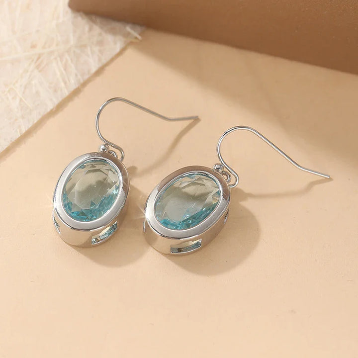 Silver Oval Sea Blue Dangle Earrings