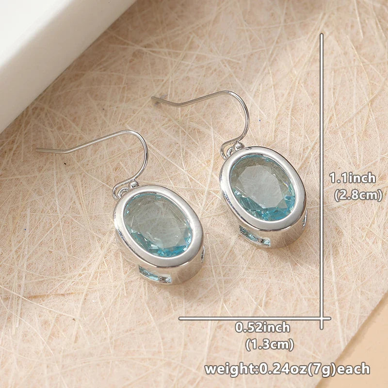 Silver Oval Sea Blue Dangle Earrings