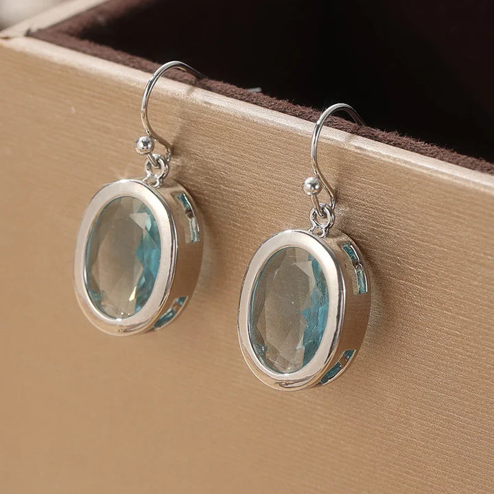 Silver Oval Sea Blue Dangle Earrings
